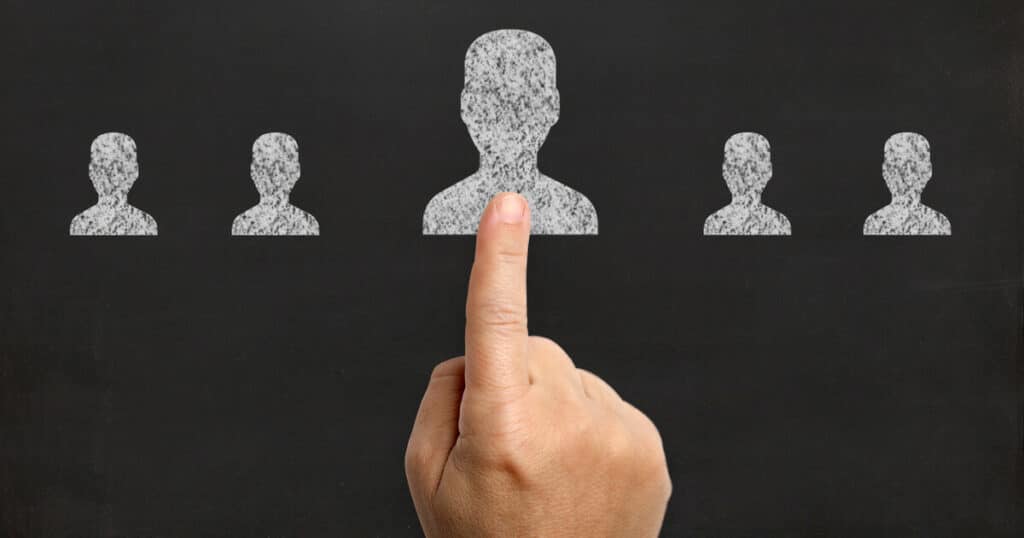 Person is deciding how to choose a heating and air conditioning contractor.