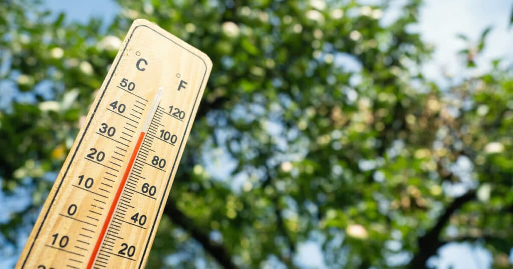 Thermometer reading 80 degrees Fahrenheit, expert AC temperature advice for Northern Virginia homeowners.
