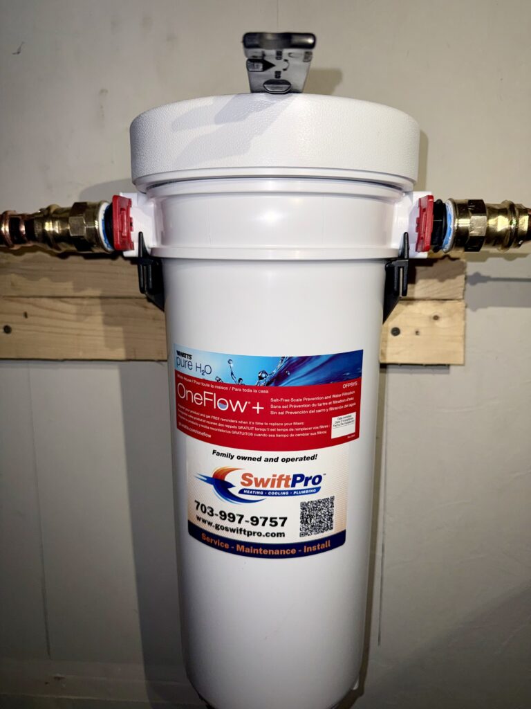 Whole house water filtration system installed in a Northern Virginia home, a salt-free scale prevention unit plumbed into the main copper supply line