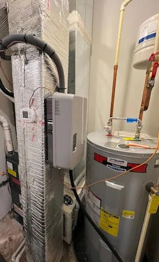 Water heater and insulated ductwork in a basement setting