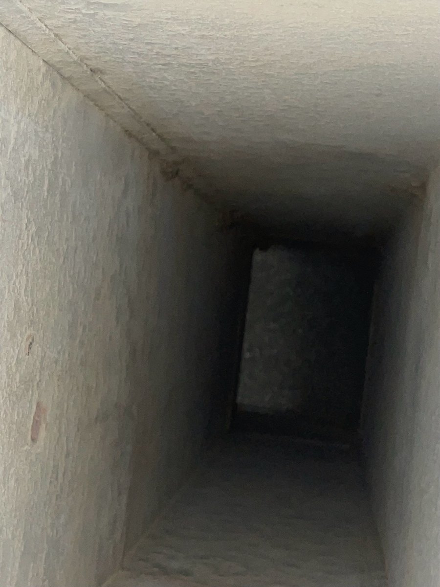 The same Northern Virginia supply duct after a SwiftPro cleaning, bare sheet metal with the dust removed