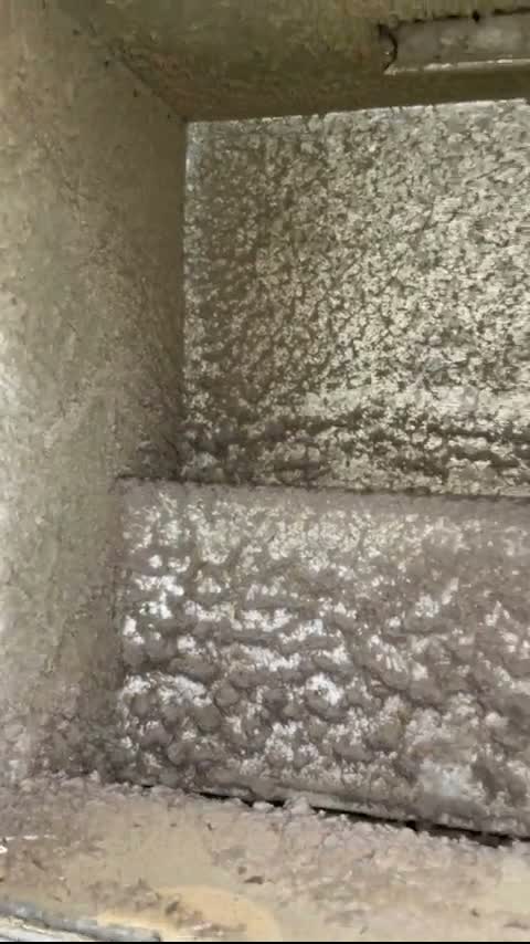Inside a lined return duct in a Northern Virginia home before SwiftPro cleaned it, the liner coated in grey dust