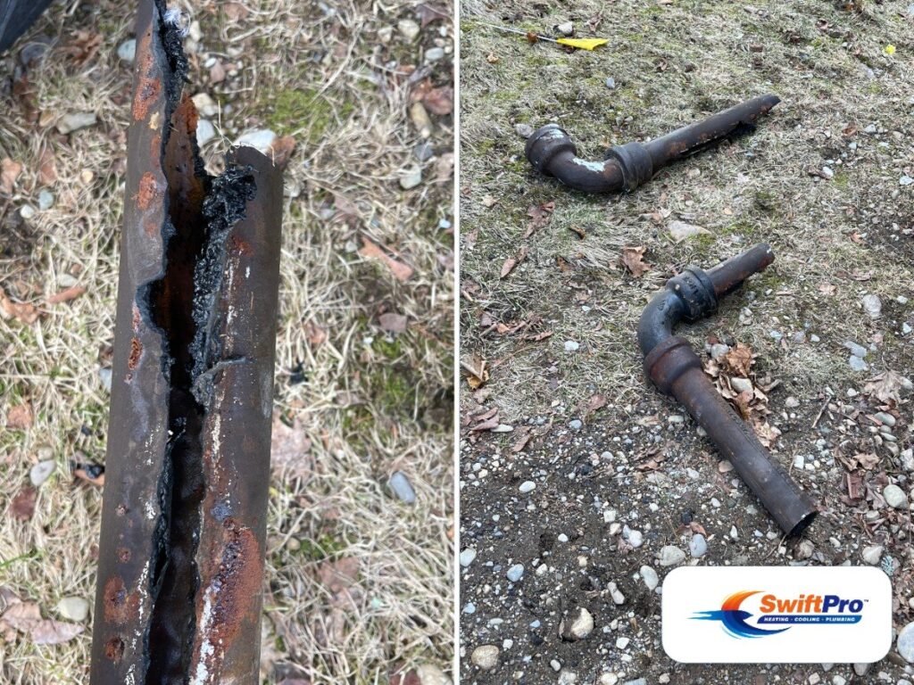 Two corroded and split sections of pipe removed by SwiftPro from a Northern Virginia home, laid on the ground for the homeowner to see