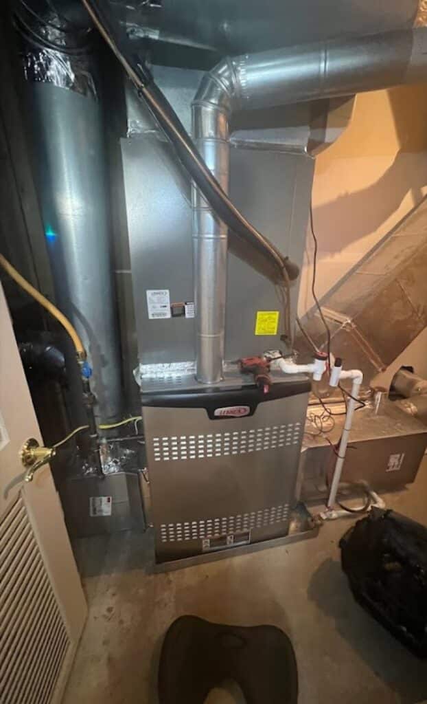 Lennox gas furnace installed by SwiftPro with new venting and gas line in a Northern Virginia utility room