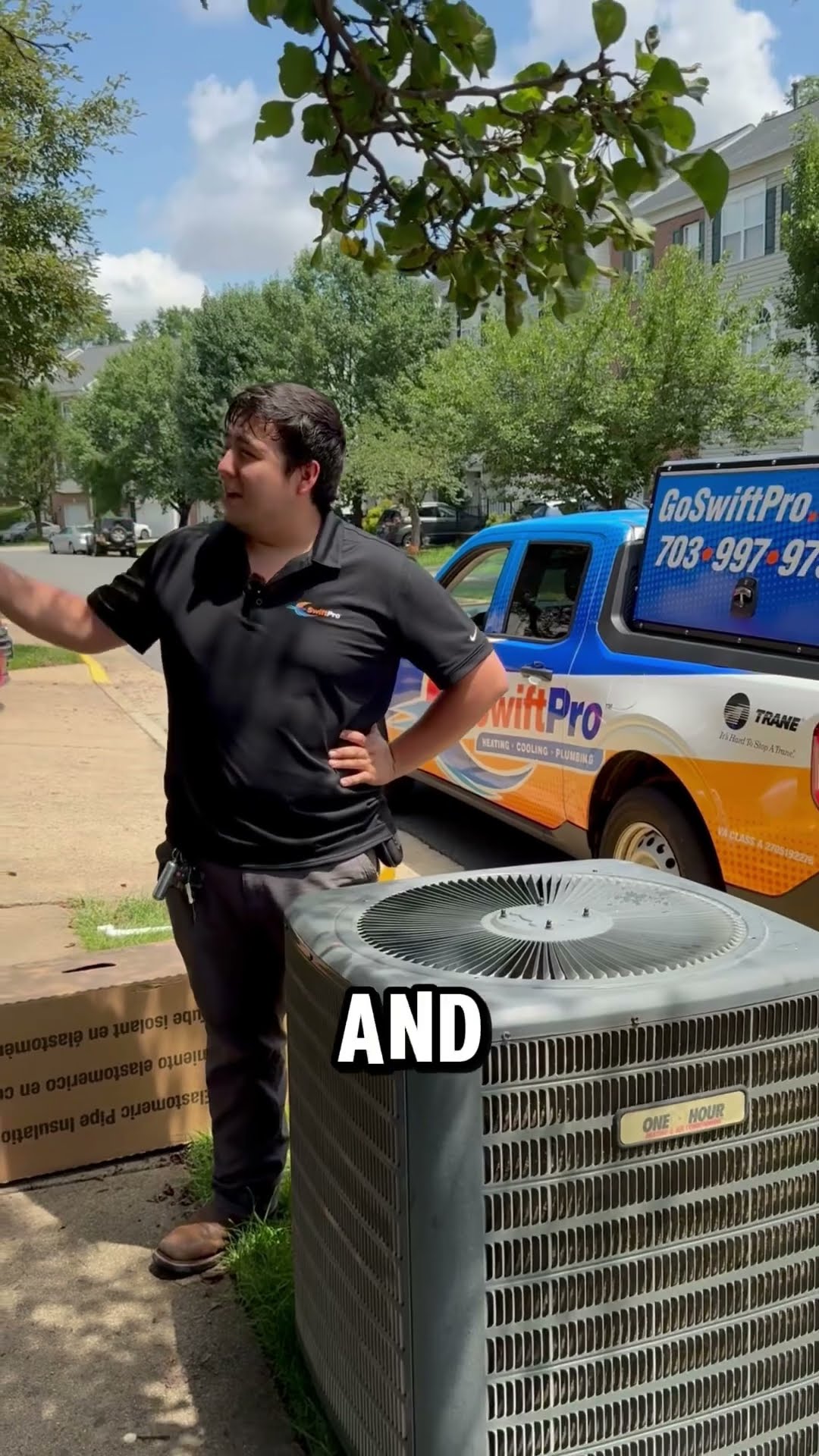 A tech introduced as Ronnie, in a black SwiftPro polo, stands beside an old outdoor AC condenser on a townhouse lawn, with a Trane-branded SwiftPro pickup (GoSwiftPro.com, 703-997-9757) and boxed new 