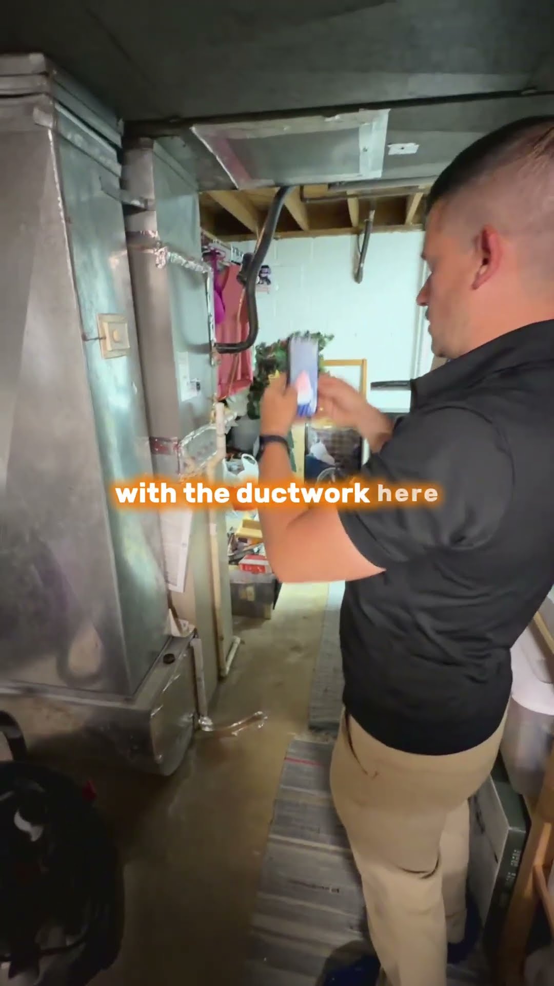 Same in-home visit as YeGFpt7bXao: the homeowner points out the line route in the basement, the SwiftPro rep photographs the ductwork and furnace plenum with a phone, then stands on the front lawn of 